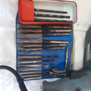 Hand Held drill machine in good running condition