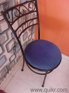 Set of 2 Wrought chairs with attached padded cushion for sitting. fo