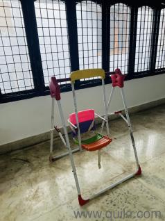 Kids toy swing (multicolour) single seated.