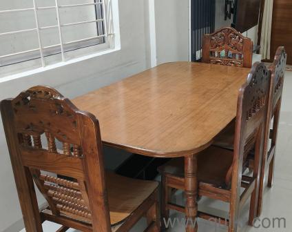 4-seater teak wood heavily hand crafted dinning table