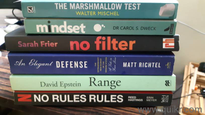 Variety of books, titles in description