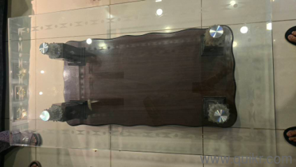 Glass top wooden center table for sale