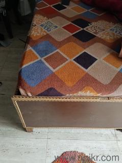 Single bed in good condition with storage compartments