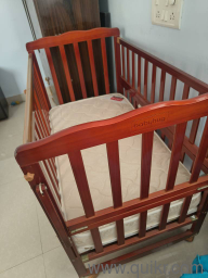 Babyhug cradle cum cot with cushion. in good condition