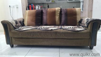 5 seater wooden sofa is on sale.