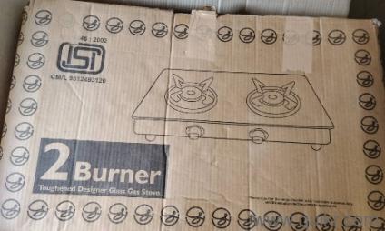 Also new 2 burner glass top is hardly used with the company regulator pipe and cylinder 