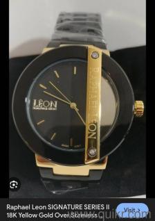 Raphael Leon beautiful black.and Gold Watch,with original box