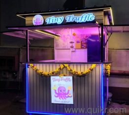 kiosk with lighting and attached stove and...