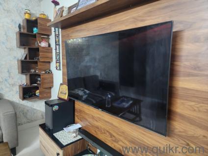 Panasonic 55in LED smart TV with remote and wall mounting bracket