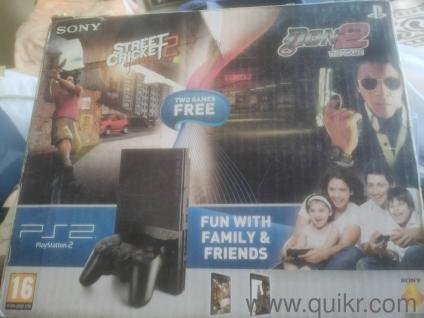 ps2 slim with 2 dual shock controllers 