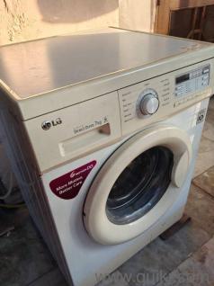 LG front load fully automatic washing machine in working condition 