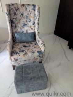 Statement Chair. with a cushion and a Footrest