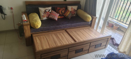 sofa cum bed with storage 3 seater and center table  in good condition without any scratches look like new 