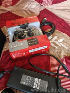 Xbox 360 with 100 games and 500gb storage with kinnect and 1 wireless controller 