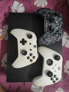 xbox one x with 3x controller 