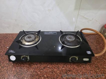 Gas stove with cylinder