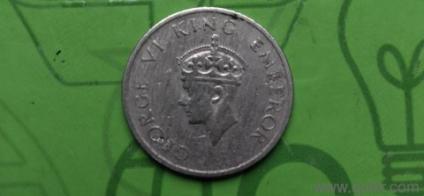 100 year old coin half paise 