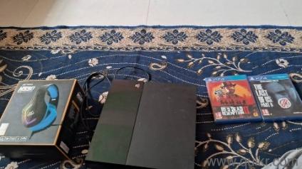 playstation 4 with 1 free gaming headphone and 12 months ps plus deluxe membership 400+ games free 