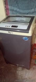 washing machine near fartabad, garia, kolkata. the wire needs minor repairs.