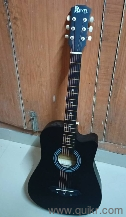 new ecoustic guitar with guitar cover and guitar pleactrum 