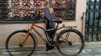 Hercules brut 27T bicycle (Orange and Black) 
