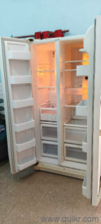 white Samsung side-by-side refrigerator
