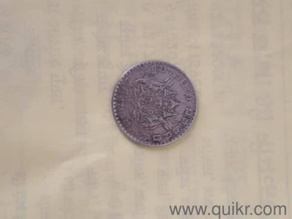 64 years old coin one anna
