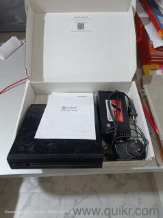 DVR with power adopter for CCTV cameras