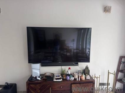 Sony 76 inch TV  with its wall mounting bracket 