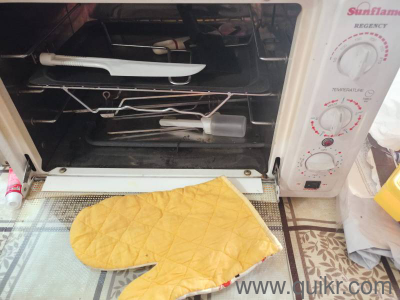 perfectly working condition, white color all tools like grill, brush, baking tray, oven mitt are there.