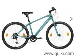 Rockrider ST30 Mountain Bicycle + Accessories  Used 1 Year