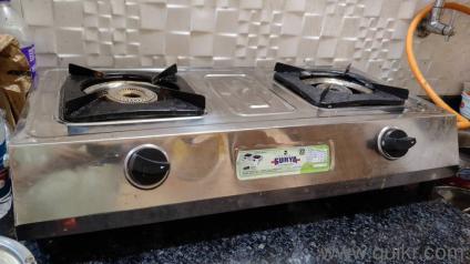gas stove, rack, cold water jar, chair