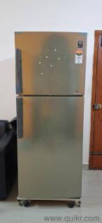 Double Door Refrigerator. Running in very good condition including stand