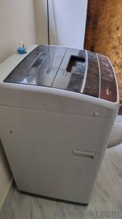 Top load fully automatic washing machine, under warranty, less than one year old 
