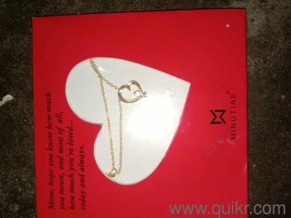 silver necklace with gold coating 