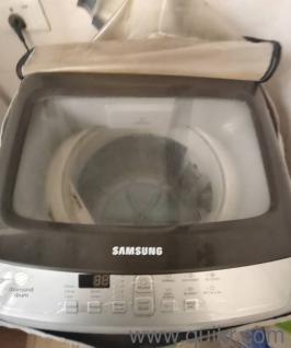 Selling the 7 year old Samsung top load washing machine with model number WA62M4100HV/TL. It works perfectly fine.