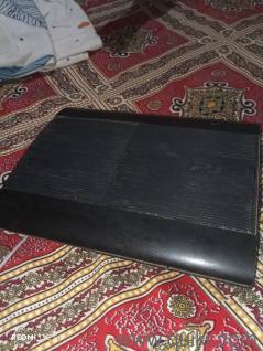 Ps3 Super Slim with 3 remotes and 16 Games 