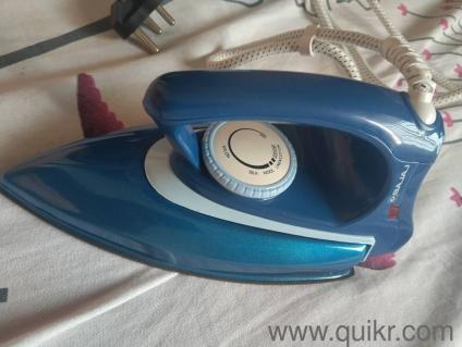 brand new Bajaj iron box with warranty card