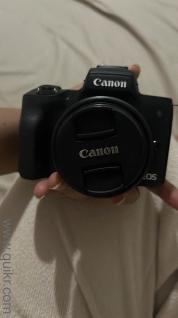 Canon m50 mirrorless camera along with two separate lens and mount