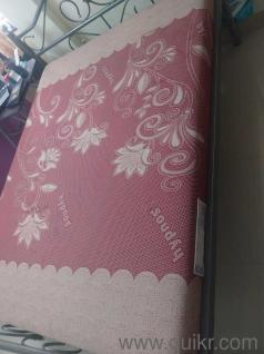 Queen size bed with orthopedic mattress.almost like new