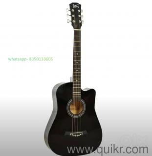 Urgent sale! My brand new black glossy guitar needs a new home.