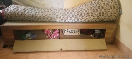 Sturdy solid wood single bed with storage
