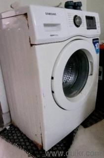 5.5 kg front load fully automatic 13 yrs old. sellingAS- IS condition -heavily used,working power on 