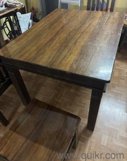 Solid wood dining table with sunmica sheet on top