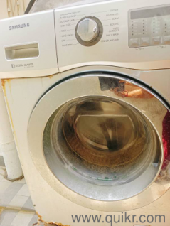 Samsung Front Load washing machine 6kg 5 years old.. excellent working condition. Stand and cover free