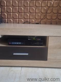 LG home theater in vwry good condition, with speakers one woofer and music player.