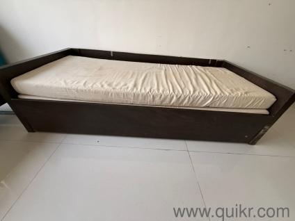 Sturdy Wooden Sofa-Cum-Bed with Storage!