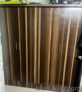 Wooden Wardrobe, Bed, dining table, Tea table and Temple