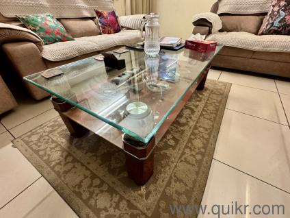Glass top and bottom center table