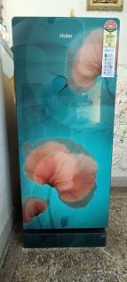 Haier 195 litre Glass door inverter Refrigerator with ice technology 